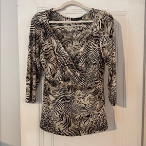 Sexy, stretchy & stylish! Animal Print V-Neck Top.